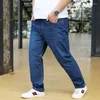 Jeans herr plus storlek 32-48 200 kg män stretchig lös jeans med vida ben Extra stora slitstarka Casual Business raka byxor