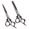 tijeras de corte de cabello morado