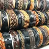 Chaîne en gros 50pcs bracelets et bracelets en cuir pour hommes femmes unisexe assortis rétro top charmes authentiques mélange tribal styles bijoux 230710