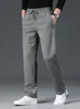 Pantaloni da uomo Tasche con zip a molla Pantaloni lunghi da uomo Pantaloni da jogging Blu Nero Grigio Abbigliamento sportivo Pantaloni casual in cotone da pista dritta 230711