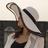 Chapeaux à large bord HT2504 chapeau de soleil été Anti-UV dame femmes solide plaine disquette paille pour femme maille plage