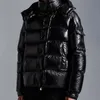 Mens Down Jacket 70e anniversaire Manteau d'hiver Designer Puffer Vestes Casual Réfléchissant Femmes Unisexe Cardigan à capuche Zipper New Epaulet123