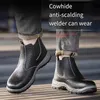 Labor protection shoes men's anti-smashing and anti-stabbing steel baotou refractory flower welder shoes site work four seasons wholesale