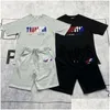 メンズジャージ Trapstar メンズショーツと T シャツセットデザイナーカップルタオル刺繍レターレディースクルーネックトラップスタートレーナー Dhqii