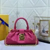 Monogramas de designer Bolsas de embreagem Bolsas de luxuros femininas com cadeia Saco de clasco rebitado em cadeia