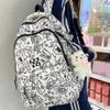 School Bags Kawaii nylon backpack cartoon printed shoulder bag cute doll pendant Rucksack large capacity lightweight unisex student bag 230712