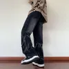 Jeans da uomo Hip Hop Pantaloni strappati vintage Pantaloni da uomo in denim punk Maschile Harajuku Streetwear Design Catena retrò casual allentata