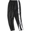 Pantaloni da uomo Arrivo Hip Hop Streetwear Pantaloni da jogging Uomo Studente Pantaloni cargo casual Pantaloni con bottoni aperti Vita elastica Ragazzi larghi