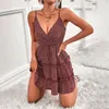 Robes décontractées été femmes volants Mini robe Sexy imprimé fleuri dos nu Double niveau une ligne Spaghetti sangle courte