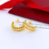 Designer kulörhänge för män och kvinnor i rostfritt stål 18k guld örhänge High end mode örhängen rese-semestertillbehör med presenter för teambröllopssmycken