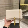 Designer dames heren WOC kwastje gewatteerde tas Beroemde klassieke echt lederen metalen ketting Lock handtassen Luxe tote schouder ronde clutch Crossbody kaviaar Tassen