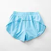 Designers LL Shorts Calças de cintura alta Respirável Quick-Dry Yoga Shorts Zip up Drop-in Pockets calças cargo calças femininas com calças com cordão contínuo