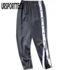 Pantaloni da uomo Arrivo Hip Hop Streetwear Pantaloni da jogging Uomo Studente Pantaloni cargo casual Pantaloni con bottoni aperti Vita elastica Ragazzi larghi