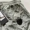 sommar herrshorts med meshfoder utomhus fritid sport nylonshorts lösa herr strandbyxor Athleisure mode Wrinled Board Mini