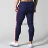 Spodnie męskie wiosna i jesień Nowe mody, pojemne spodnie do joggingu bawełniane fitness Running Casual Men's Sports Black Training Spodnie J230714