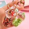 Keychains Lovely Watermelon Lemon Fruit Milk Bottle Keychain Floating Moving Liquid Quicksand Drift Keyring For Women Bag Pendant