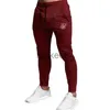 Pantaloni da uomo Pantaloni da uomo in poliestere di marca Spagna Sik Silk Pantaloni casual da fitness Pantaloni da jogging sportivi da allenamento quotidiani J230712