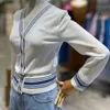 Pull de créateur de mode femmes tricot cardigan pardessus Saturne brodé cardigan manteau col en V à manches longues t-shirt tricots décontractés