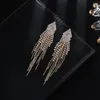 Boucles d'oreilles pendantes YFJEWE fait à la main Long gland pour les femmes déclaration strass luxe cristal goutte boucles d'oreilles bijoux de soirée E658