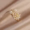Nouveau Design bijoux de mode 14K plaqué or véritable exquis feuille fleur Zircon anneau élégant femmes ouverture quotidienne anneau réglable