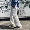 Mäns jeans vibe rippad industri Loose street skateboard byxor stil rak våren blossade tung 2023 hip-hop amerikansk vit