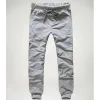 Gros-2016 Hommes Joggers Cargo Unique Pocket Hommes Pantalons à lacets Pantalons de survêtement Harem Pantalons Hommes Jogging Sport Pantalons Hommes Pantalones Hombre mvG