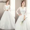 Modest Chinese Wedding Gowns With Long Sleeves Scoop Neck Lace Appliqued Bridal Dress Floor Length Puffy Skirt Princess Vestidos D240x