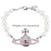 Pulseras con dijes Emperatriz viuda West Pink Diamond Mujer Vivian French Esmalte Pearl Bracelet Drop Delivery Jewelry Dhfe8