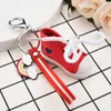 Keychains Mini ILOVEYOU Creative Sneaker Keychain Couples Fashion Canvas Shoes Leather Rope Key Chain Bag Accessories Pendant PVC Jewelry