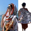 Foulards belles femmes Wrap Anti-UV léger Style ethnique été voyage Po Prop châle mince plage approvisionnement