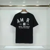 Designer Mens T Shirt Men's Tshirt Brodered Logo Badge Womens Designer Clothes Amari Shirt Size S/M/L/XL/XXL/XXXL