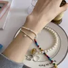 Strand Versione coreana avanzata di piccola fragranza leggera Folla di lusso Squisito braccialetto di perle d'amore a doppio strato da donna 2023