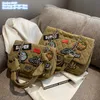 工場大規模なレディースショルダーバッグ2色クラシック格子形のファッションハンドバッグソフトキャンバスバックパックバックパック装飾的なパーソナライズされたチェーンバッグ