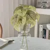 Dekorativa blommor Simulering Grön växt Ingen vattning Lättvikt Dekorera Hjärtform Konstgjorda blad Scen Layout Falska hemmaterial