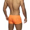 Traje de baño para hombres Bañadores europeos y americanos Color sólido Secado rápido Cintura baja Pantalones de playa sexy Pantalones cortos deportivos 230712