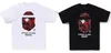 Designer Mens T-shirt Summer Mens Starry Camo Streetwear Tees Painted Shark Uomo Donna Tees T-shirt T-shirt di marca famosa Coppie Top Abbigliamento Pullover M-3XL