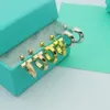 Nya Sterling Sier Jewelry T Letter C -formad cirkulär ringguldfylld Diamond Women's Hardwears Earrings Brand Designer Offical Graved