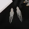 Brincos pendentes YFJEWE Feito à mão com borla longa para mulheres Declaração de strass Brincos de gota de cristal de luxo Jóias para noite E658