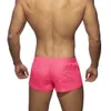 Badkläder för män Europeiska och amerikanska badbyxor Enfärgad Snabbtorkande Låg midja Sexiga strandbyxor Sportshorts 230712