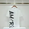 مصمم Mens T Shirt Tshirt tshirt شارة شعار للنساء مصمم ملابس Amari Size S/M/L/XL/XXL/XXXL