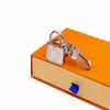 Nouveau alliage serrure conception astronaute porte-clés accessoires designer porte-clés solide métal voiture porte-clés boîte-cadeau packaging278S