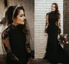 Svart sjöjungfru lång ärm gotiska bröllopsklänningar knappar rena spets applikation bohemiska land brudklänning vestido