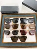Damen-Sonnenbrille für Damen und Herren, Sonnenbrille im modischen Herren-Stil, schützt die Augen, UV400-Linse, mit zufälliger Box und Etui 7983