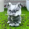 Statue de chat assis chanceux en jaspe mille yeux