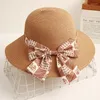 Chaps à bord large femmes Femmes Summer Soleil Paille Big Usaves Bowknot Ribbon Beach Holiday Fold Fisherman Cap Tempérament Flat 2023