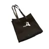 Wholesale Summer New Large Capacity Totes Black and White Canvas Shoulder Bag Versatile Student Handheld Shopping Bags