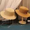 Brede Rand Hoeden Emmer Hoeden Zomer Elegante Parelketting Platte Zonnehoeden voor Vrouwen Chapeau Feminino Strooien Hoed Panama Brede Rand Anti-UV Strand Cap Meisjes Hoed 230713