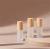 Garrafas de rolo de vidro transparente fosco 5ml 10ml com rolos de metal bola frascos de óleo essencial com tampa de bambu JL1564