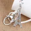 سلاسل المفاتيح Crystal Eiffel Tower Model زوجين مفاتيح سلسلة Key -key Chain Women Women Bag Bucle Ring Ring لسلاسل السيارات هدية قلادة