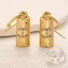 20 stili di designer di marca Sier placcato oro fascino orecchino a bottone lettera orecchino in acciaio inossidabile intarsiato cristallo Eardrop Ear Loop Wedding